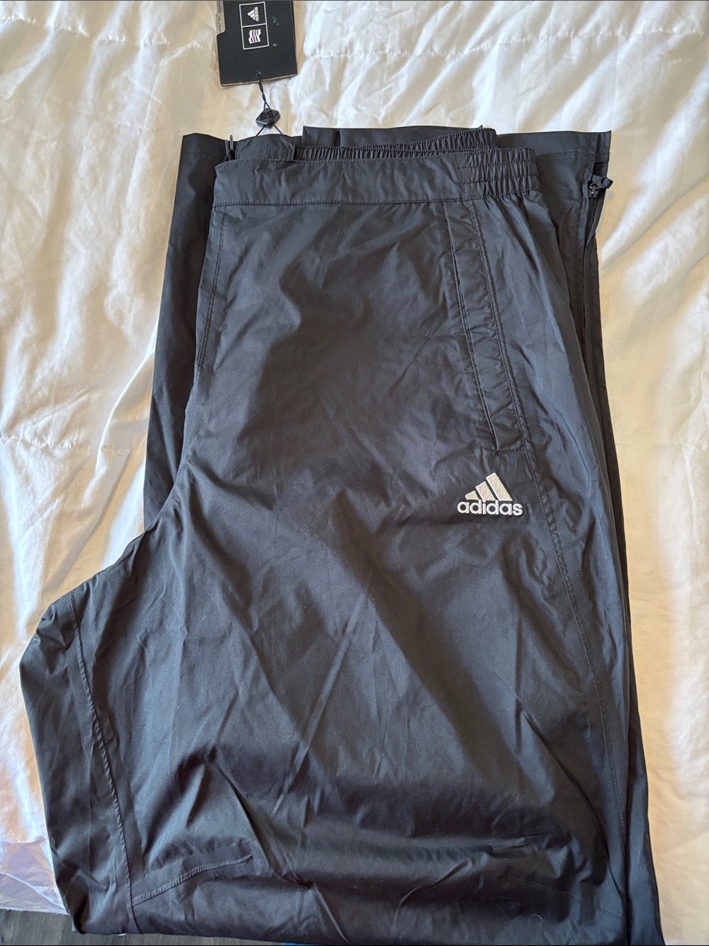 adidas Black Men's Lightweight ClimaProof Rain pants.